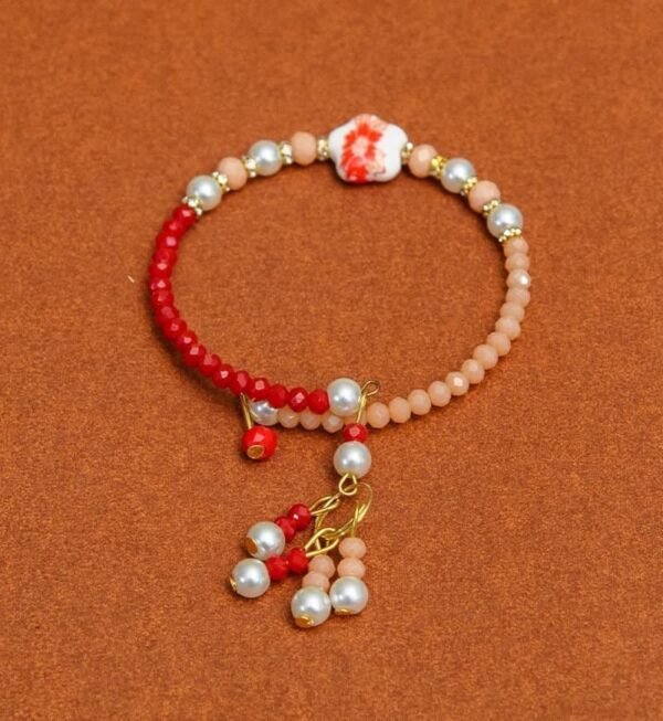 Red and Peach color Pearl Bracelet Rakhi For Women