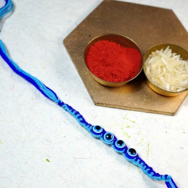 Evil Eye Charm Thread Rakhi In Blue (12 pcs) - Image 2